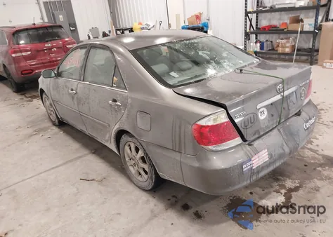 2006 Toyota Camry Xle z USA, uszkodzony, nr VIN 4T1BE30K86U701640